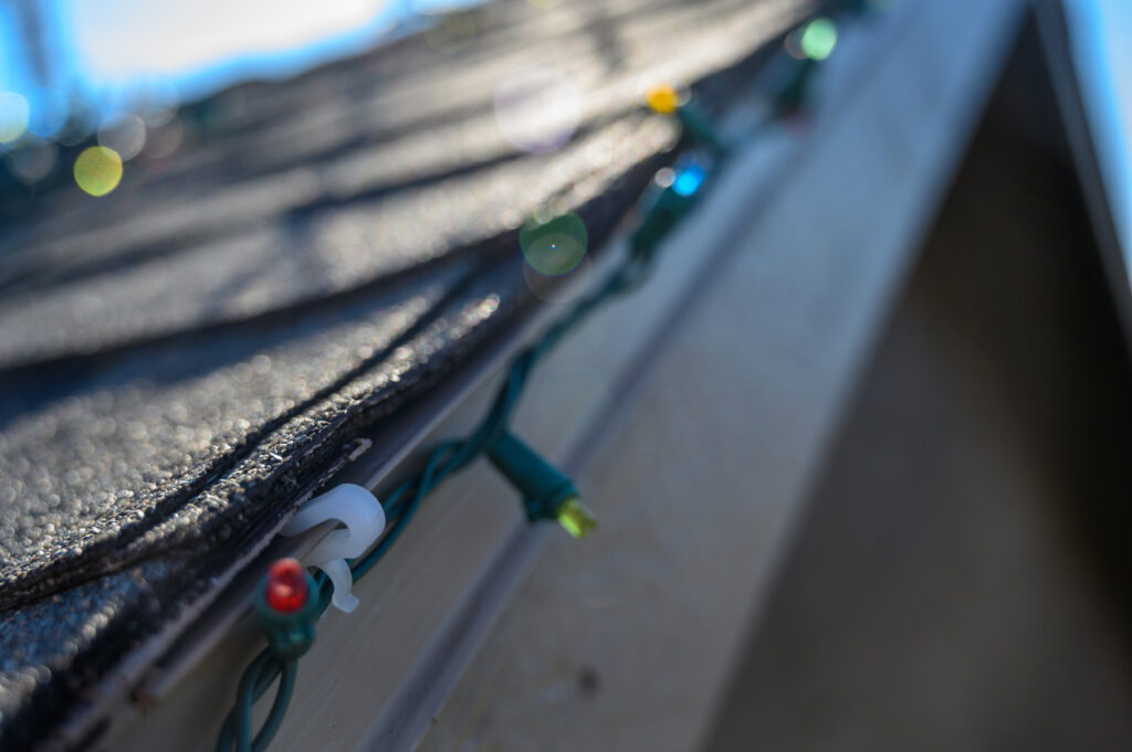 holiday LED lights hung with plastic clips